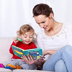 child reading mom baby book